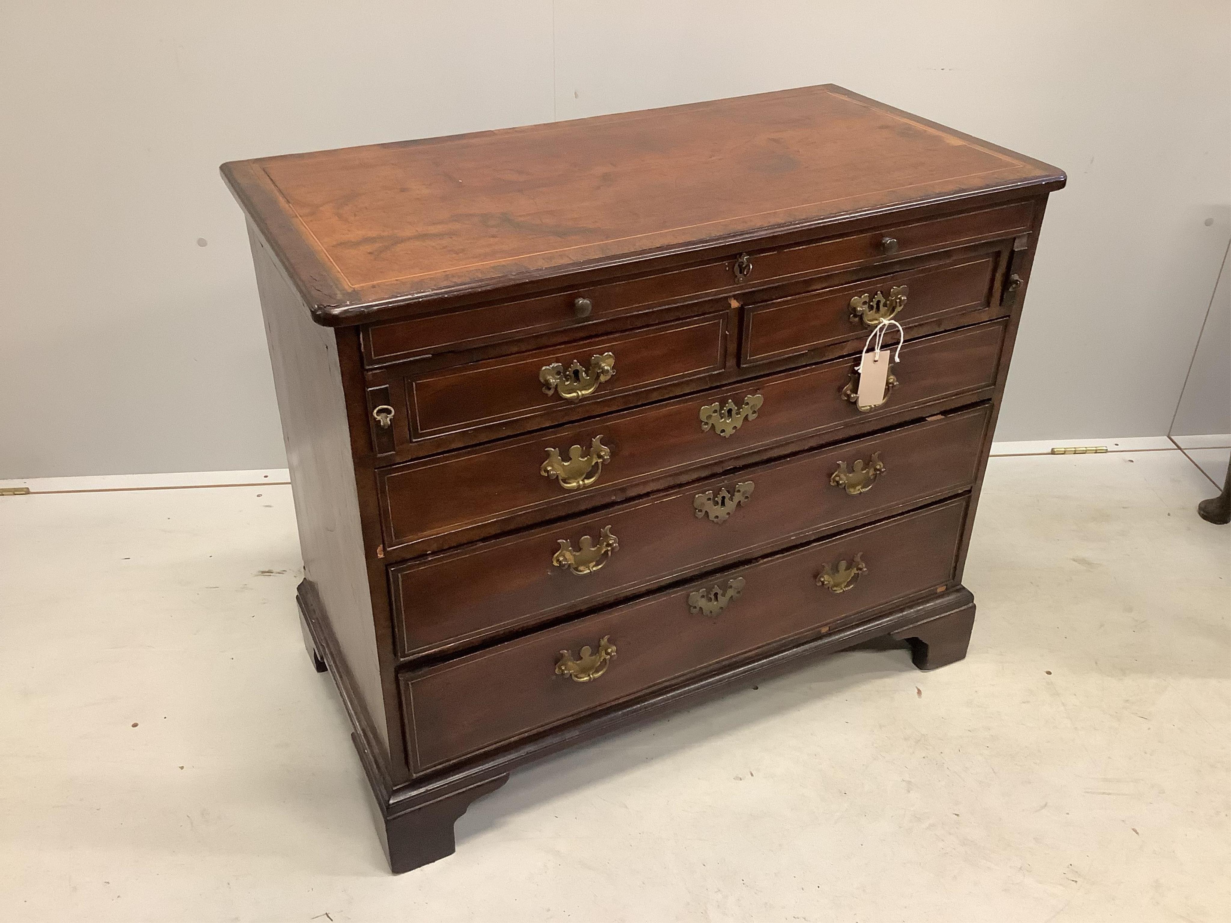A George III, possibly padouk, brass inlay,dressing chest in the manner of John Channon, width 88cm, depth 47cm, height 74cm. Condition - fair